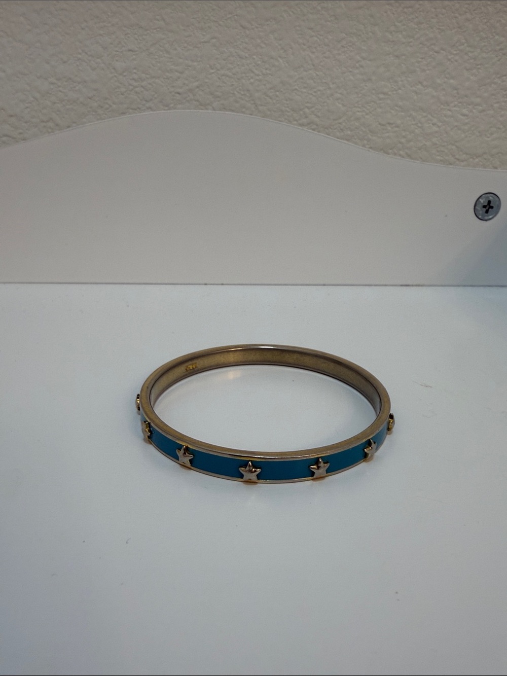 Coach Gold-Tone Teal Enamel Star Bangle Bracelet